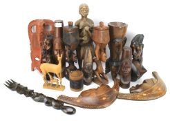 An assortment of African carved wooden tribal figures.