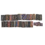 A collection of printing press letter blocks.