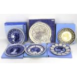 A collection of Wedgwood commemorative ceramic plates regarding the British Royal Family.