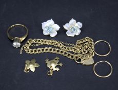 An assortment of gold and yellow metal jewellery.