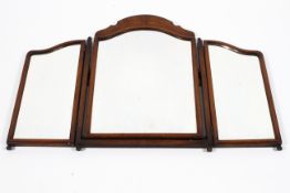 A 19th century mahogany framed arched top triptych dressing table mirror.