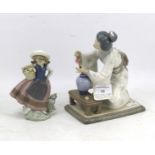 Two Lladro figures.