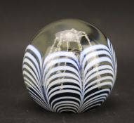 A limited edition 165/1000 glass paperweight.