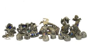 A collection of dragon models. The metal figures designed by Mark Locker, largest H14.