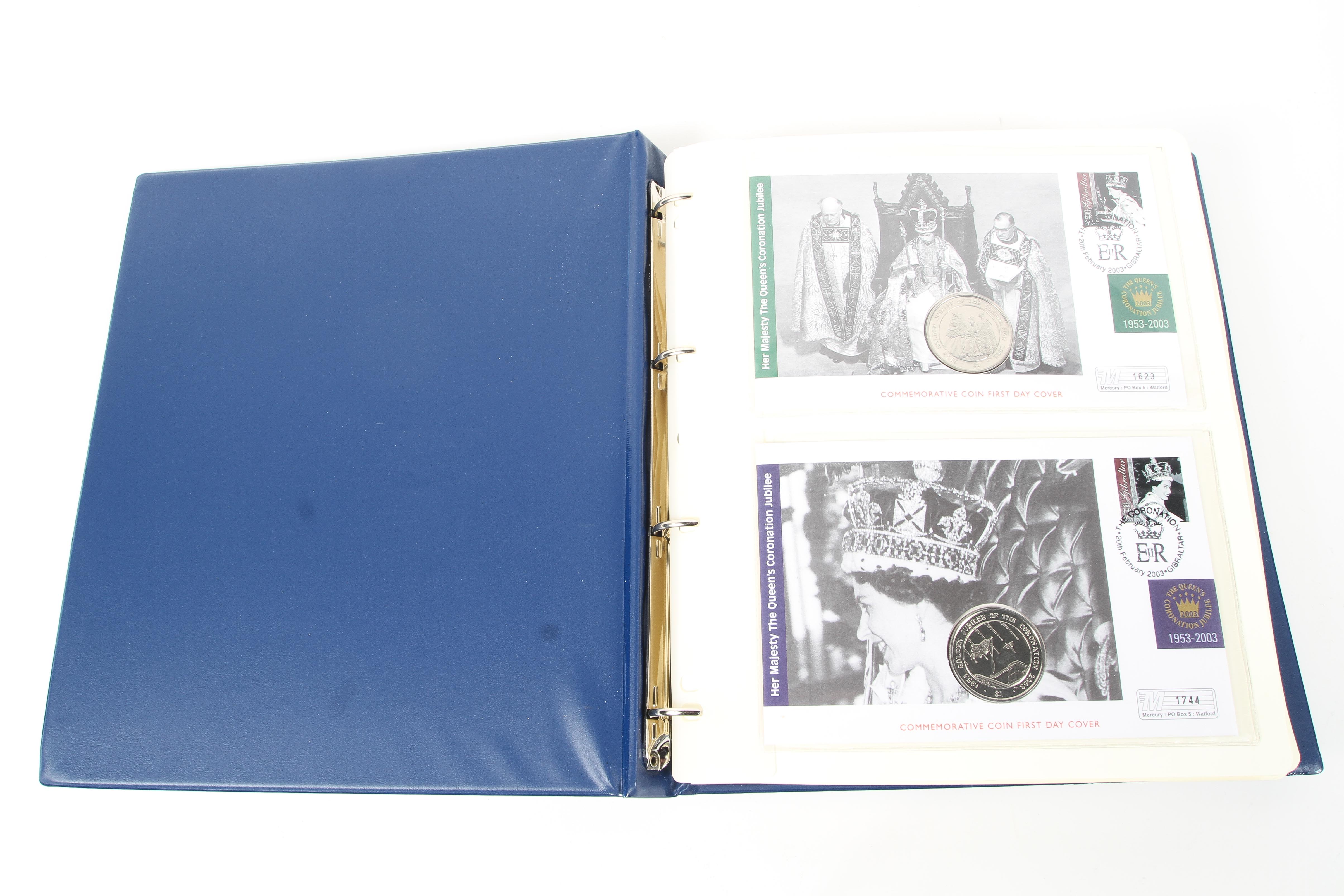 A folder containing a collection of Royal Commemorative First Day coin covers