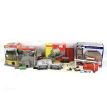 An assortment of trains buildings and accessories.