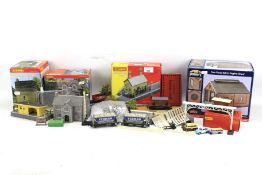 An assortment of trains buildings and accessories.