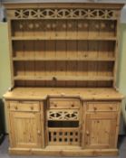 A 20th century pine kitchen dresser.