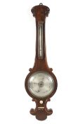 A Victorian mahogany banjo barometer.