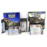 A box of assorted DVDs all related to steam & rail.