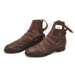 A pair of brown leather vintage riding boots. Marked Fussels, size 5 1/2.