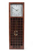 A contemporary quartz wall clock in the style of Charles Rennie Mackintosh.