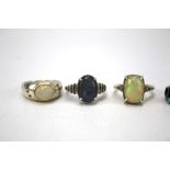 A collection of silver and stone set rings. Including opal examples. Total weight 29.