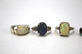 A collection of silver and stone set rings. Including opal examples. Total weight 29.