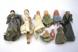 A collection of miniature dolls.