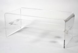 An Amalfi style perspex rectangular coffee-table. D-shaped, with lower shelf, L95cm x D45cm x H40.