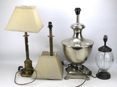 Four contemporary table lamps.