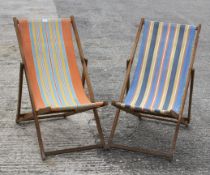 A pair of folding deckchairs by Hatherley.