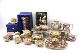 An assortment of chintz decorated ceramics.