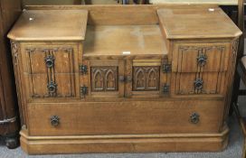 A 20th century oak veneer dressing table.