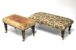 A large upholstered foot stool and a smaller stool.