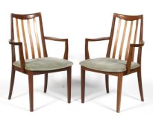 Two G-Plan teak carver armchairs.