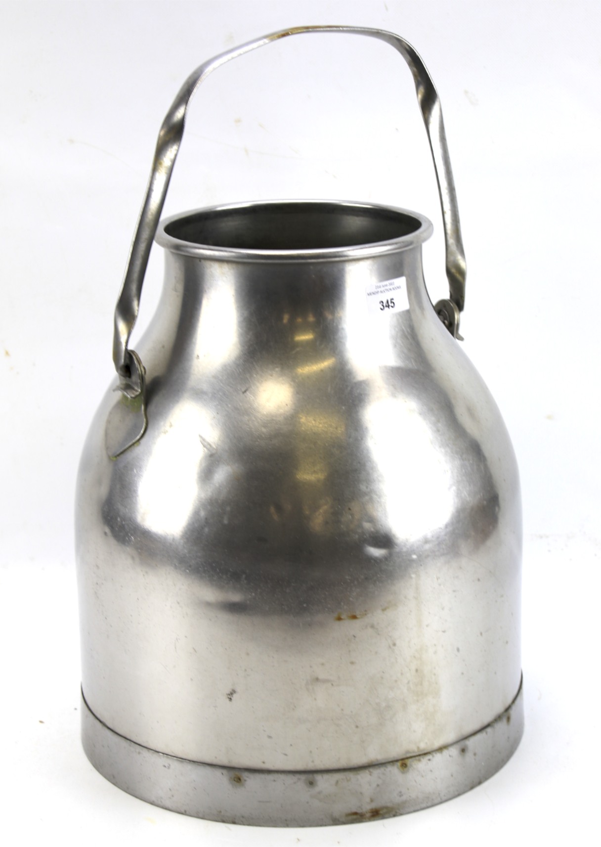 A vintage steel milk churn.