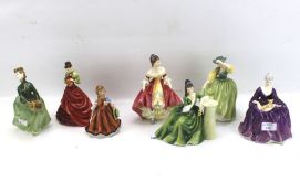 Six Royal Doulton figures.