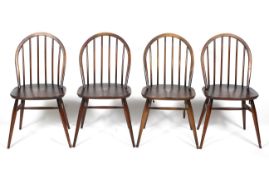 A set of four Ercol dark elm and beech Windsor chairs.