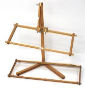 A modern wooden tapestry weaver stand.