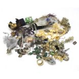 A bag of assorted costume jewellery.