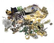 A bag of assorted costume jewellery.