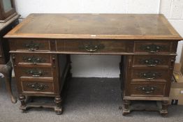 A 19th century oak twin pedestal desk.