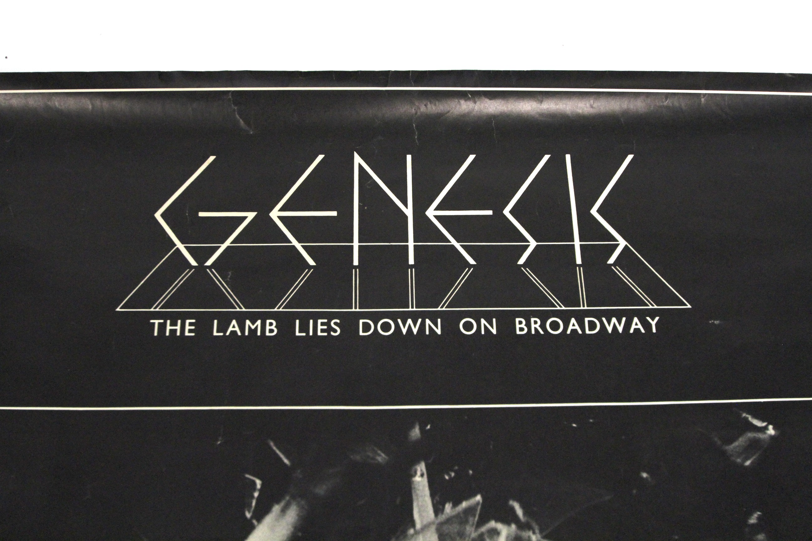 A Genesis 'The Lamb Lies Down on Broadway' album poster. - Image 3 of 3