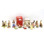 A collection of Royal Doulton figures.