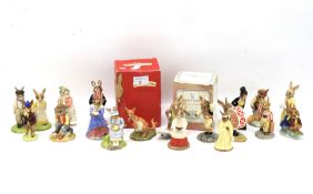 A collection of Royal Doulton figures.