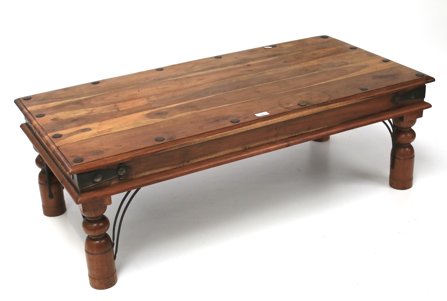 A contemporary hardwood coffee table.