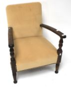 A 1930s oak elbow chair, .