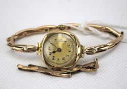 A vintage 9ct gold cased 'Long Swansea' ladies wristwatches.