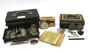 A collection of coins and bank notes.