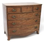 An early 19th century mahogany bow fronted chest of drawers.