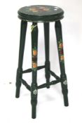 A 20th century bargeware style painted bar stool.