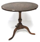 A 19th century mahogany tripod table.