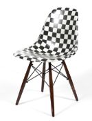 After Charles and Ray Eames, a DSW style checkered chair.