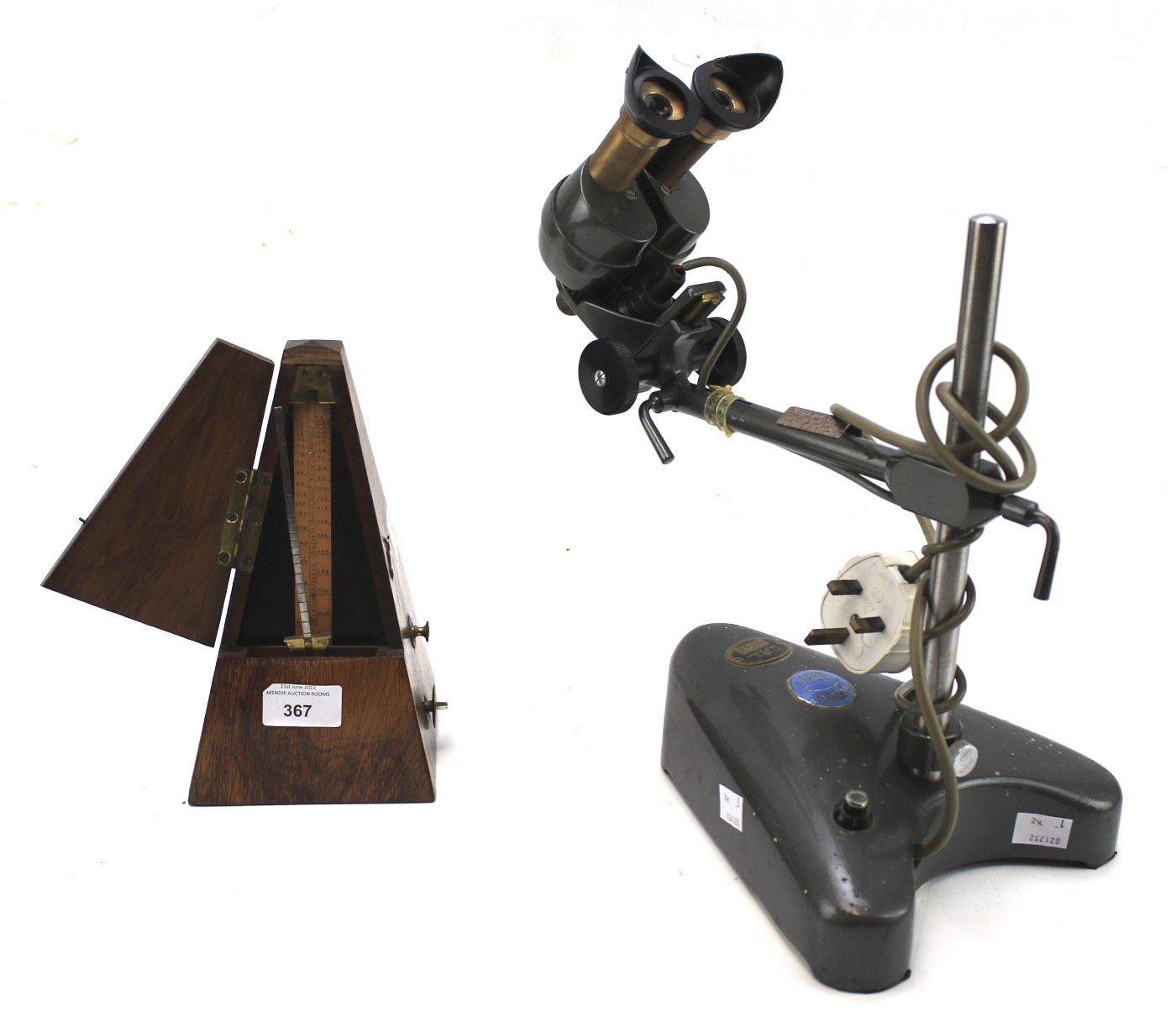A De Maelzel Metronome and a C Baker microscope. The metronome in a rosewood case, H23.