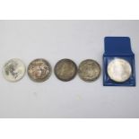 Five silver coins.