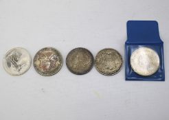 Five silver coins.