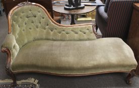 A Victorian mahogany chaise lounge.