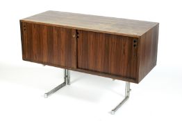 A rosewood and chrome sideboard, circa 1960.