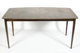 A mid-century AH McIntosh rosewood extending dining table.